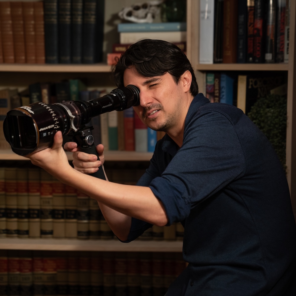 David Charry framing a shot on set